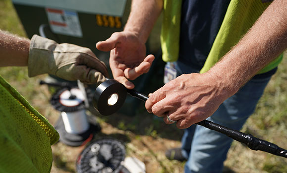 CFU Tech splicing fiber in residential neighborhood